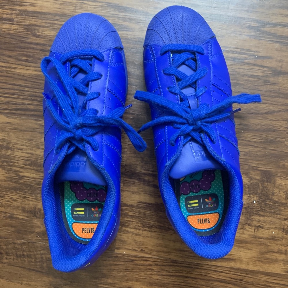 Blue adidas superstar shoes